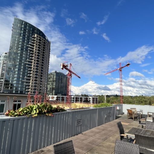 Photo of the view from a rooftop on a partly cloudy day in Portland.