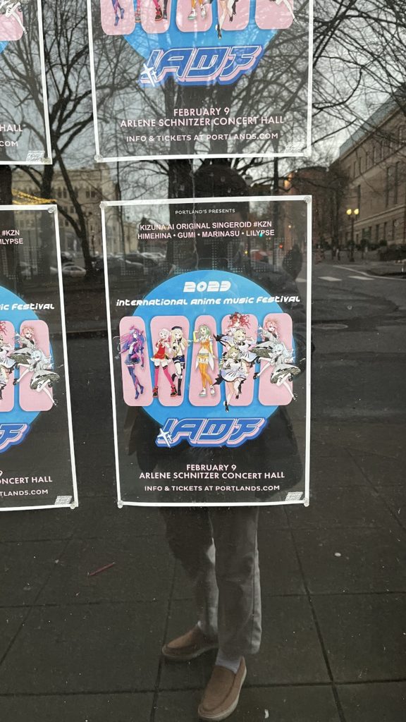 Photo of a poster promoting the upcoming 2023 International Anime Music Festival.
