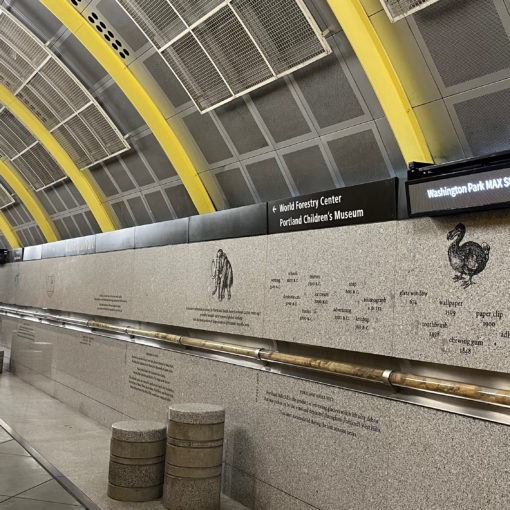 Photo of the Eastbound platform at the Washington Park MAX station showing newly activated departure boards from ConnectPoint.