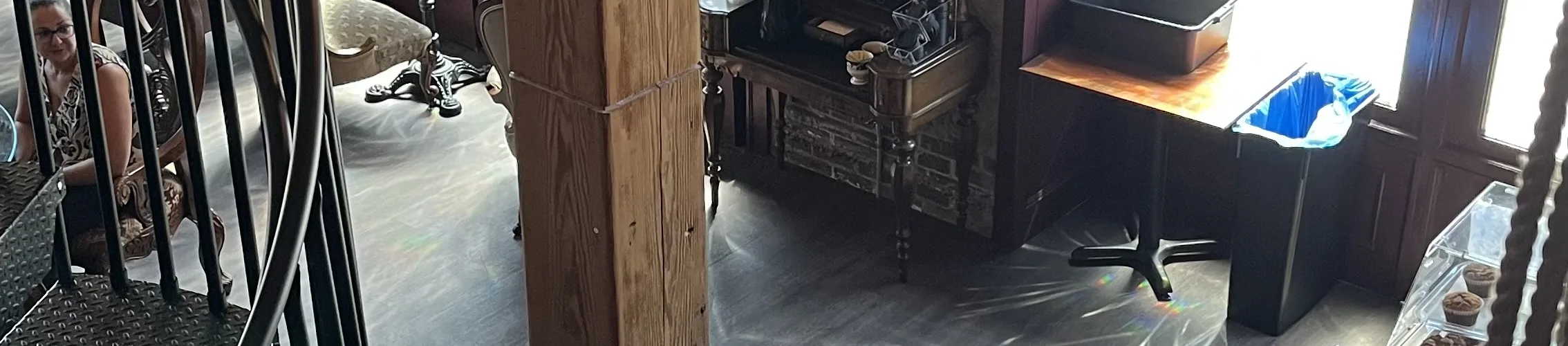 Photo taken from the mezzanine at Conspirators' Coffee Lounge looking down towards the coffee bar.