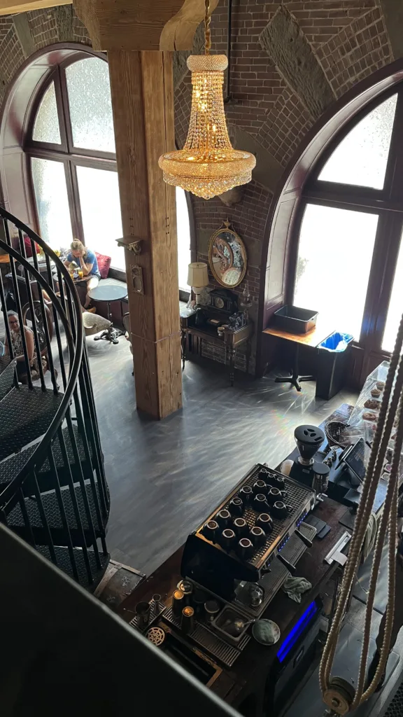 Photo taken from the mezzanine at Conspirators' Coffee Lounge looking down towards the coffee bar.